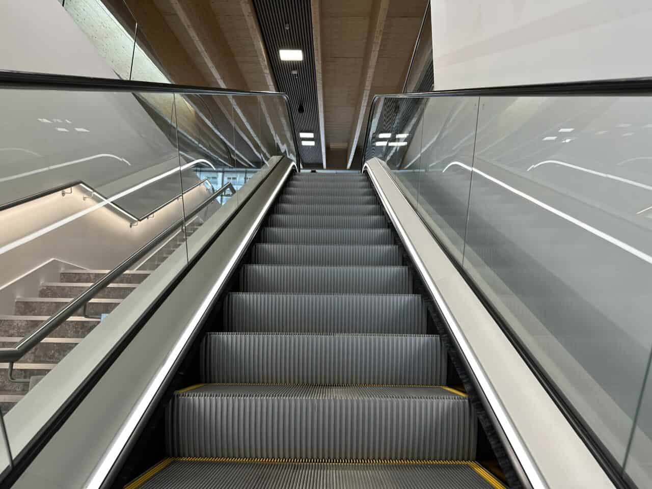 Escalator to the upper boarding area - Horizon Cruise Terminal